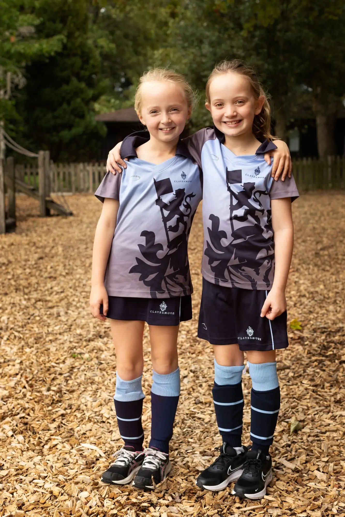 Two prep pupils in sports kit
