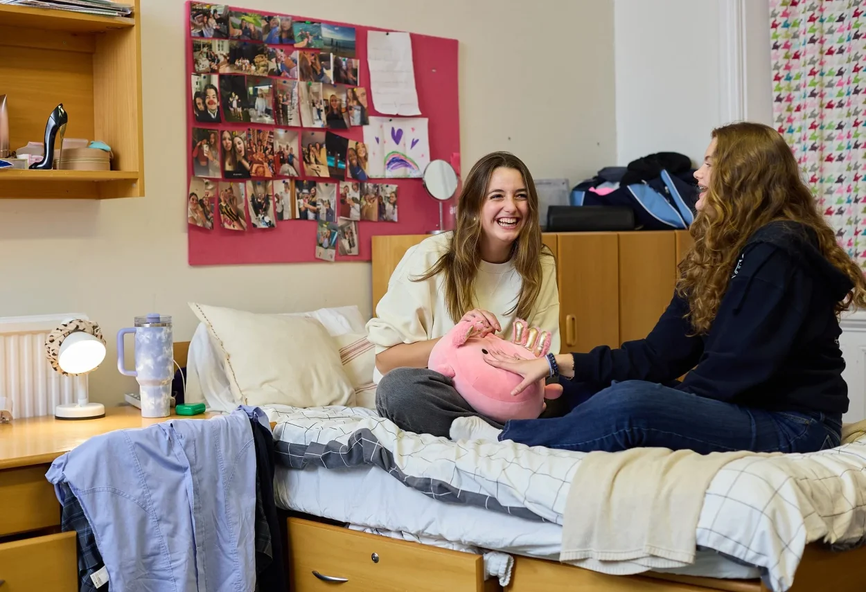 Wolverton boarders chatting in their room