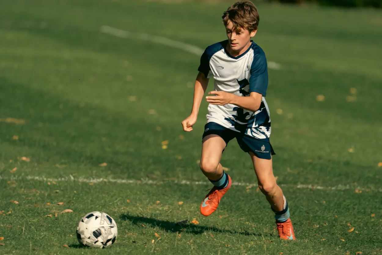 Student playing football